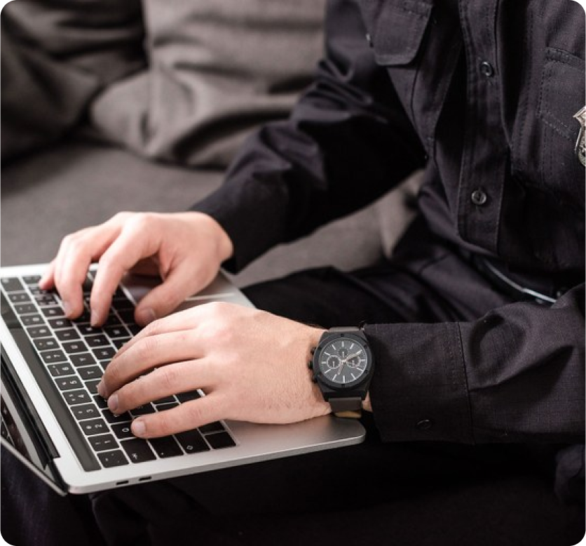 Man typing on laptop